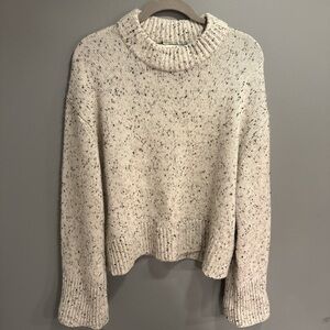 Elegant Cream Speckled Turtleneck Sweater